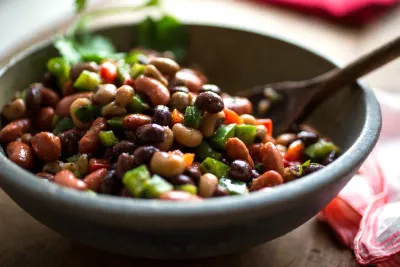Salade de trois haricots porte-bonheur avec vinaigrette au cumin